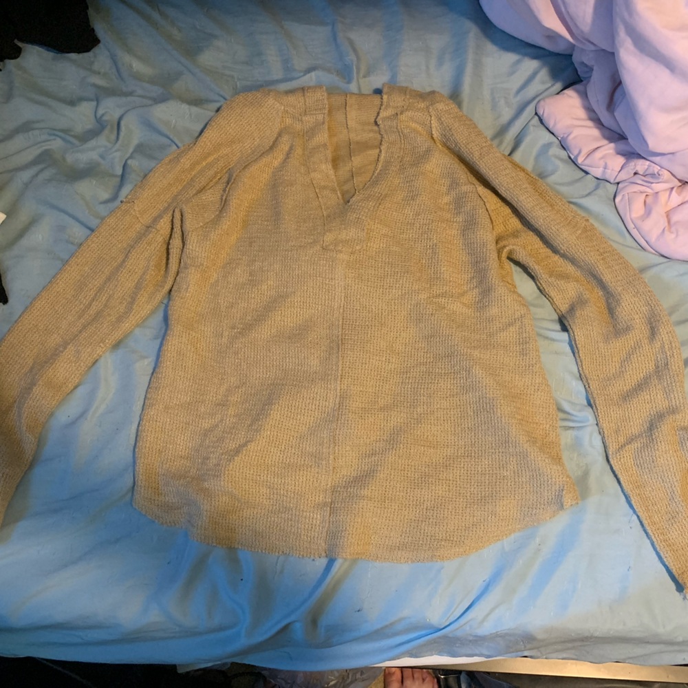 I’m selling a Loveriche Sweater. She’s weird looking but comfortable 😅 size S